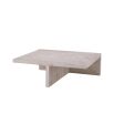 Elegant and glamorous low coffee table in travertine finish