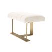 A gorgeous stool by Eichholtz with a boucle cream upholstery, deep channelled stitching and a brushed brass frame