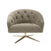 A sumptuous swivel chair by Eichholtz with a tufted greige velvet upholstery and cross shaped brushed brass swivel base 