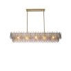 A beautiful chandelier by Eichholtz with a rectangular shape, brushed brass finish and smoke glass decorative leaf details