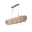 A beautiful chandelier by Eichholtz with a rectangular shape, brushed brass finish and smoke glass decorative leaf details