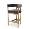 Luxurious grey velvet counter stool with brass finish legs