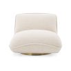 A beautiful, boucle cream upholstered chair by Eichholtz with a brushed brass base 