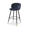 Luxurious blue velvet bar stool with black tapered legs and brass caps