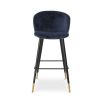 Luxurious blue velvet bar stool with black tapered legs and brass caps