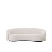 Gorgeous off-white sofa with a black base and curved back
