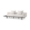 A luxurious two seater sofa by Eichholtz with an off-white upholstery and solid bronze base with a slatted table top