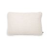 A rectangular Pausa Natural cushion by Eichholtz 