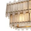 A rectangular, two-tier chandelier by Eichholtz with a contemporary twist on a classic design and an antique brass finish