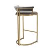 Art Deco inspired bar stool with a brushed brass frame and a grey velvet seat.