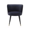 A luxurious dining chair with a dark blue velvet upholstery, swivel seat and gold capped feet