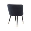 A luxurious dining chair with a dark blue velvet upholstery, swivel seat and gold capped feet