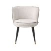 A luxury dining chair by Eichholtz with a retro design featuring a swivel seat and Lyssa Off-White upholstery