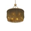 A glamorous chandelier by Eichholtz inspired by 20s extravagance with rows of gold chains and an antique brass finish 