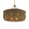 A large, eye-catching chandelier by Eichholtz inspired by the 1920s with four rows of thin chains and an antique brass finish 