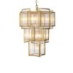 A luxurious chandelier by Eichholtz with a curved antique brass finish and decorative clear glass rods