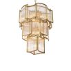 A luxurious chandelier by Eichholtz with a curved antique brass finish and decorative clear glass rods