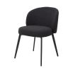 A set of two luxury dining chairs from Eichholtz with a beautiful boucle black upholstery