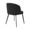 A set of two luxury dining chairs from Eichholtz with a beautiful boucle black upholstery