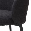 A set of two luxury dining chairs from Eichholtz with a beautiful boucle black upholstery