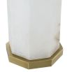 A glamorous side lamp by Eichholtz with an antique brass finish, octagonal alabaster body and linen mix lampshade