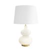 An alabaster table lamp with an hourglass silhouette and white shade.