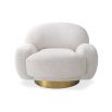 A luxury, Lyssa Off-White upholstered swivel chair by Eichholtz with a brushed brass finished base
