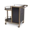 A contemporary drinks trolley by Eichholtz with a glamourous brushed brass finish 