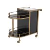 A contemporary drinks trolley by Eichholtz with a glamourous brushed brass finish 