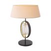 An elegant table lamp by Eichholtz with a honed marble base and gunmetal finish 