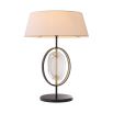 An elegant table lamp by Eichholtz with a honed marble base and gunmetal finish 