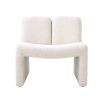 A contemporary modern chair by Eichholtz with a bouclé cream upholstery and original shape 