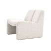 A contemporary modern chair by Eichholtz with a bouclé cream upholstery and original shape 