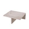 Elegant travertine coffee table featuring cubist design