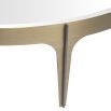 A chic, Mid-Century Modern coffee table with a beautiful brushed brass frame 