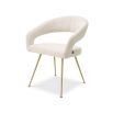 A glamorous dining chair in a range of finishes with brass tapered legs