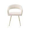 A glamorous dining chair in a range of finishes with brass tapered legs