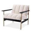 Stylish boucle cream armchair with deep channel stitching and sleek black arms