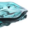 Beautiful blue glass bowl featuring an organic, curvaceous design