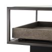Illustrious, industrial-style coffee table with three pull out drawers and glass top