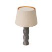 A sophisticated side lamp by Eichholtz with a grey marble base in the shape of a bamboo stem and fabric shade