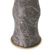 A sophisticated side lamp by Eichholtz with a grey marble base in the shape of a bamboo stem and fabric shade