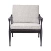 A contemporary chair by Eichholtz with a black finished wooden frame and a beautiful boucle grey upholstery 