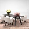 Padded cream dining chair with boxy silhouette and armrests, Complete with four black wooden legs