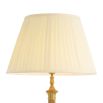Gold sculptural lamp with charming shade