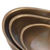 A stylish set of three vintage brass bowls by Eichholtz