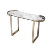 An Art-Deco inspired console table by Eichholtz with a white marble top and brushed brass finish