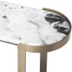 An Art-Deco inspired console table by Eichholtz with a white marble top and brushed brass finish