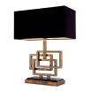 A luxury lamp by Eichholtz with a vintage brass finish