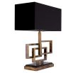 A luxury lamp by Eichholtz with a vintage brass finish